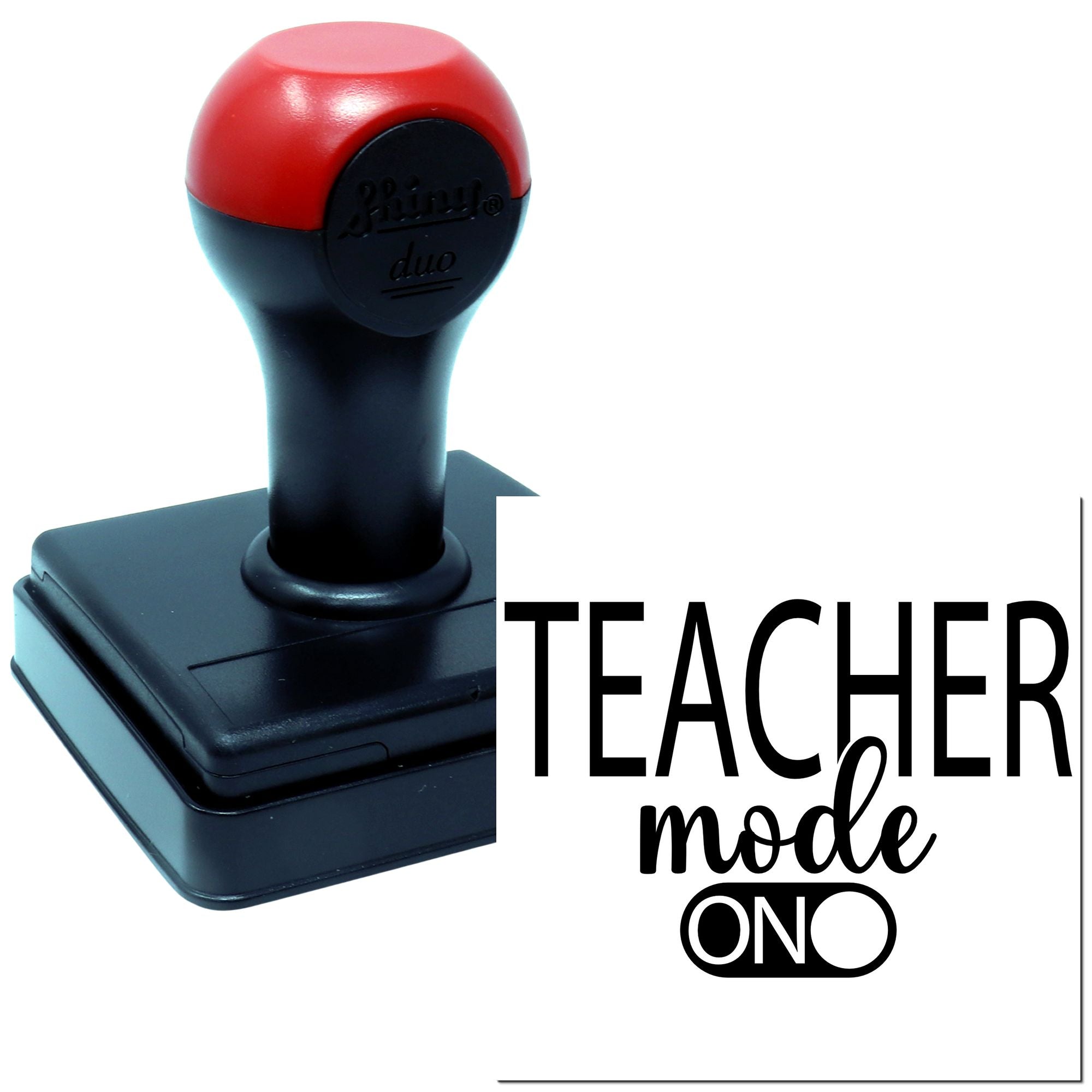 Self-inking teacher rubber stamp with Teacher Mode On text for classroom papers and school use.