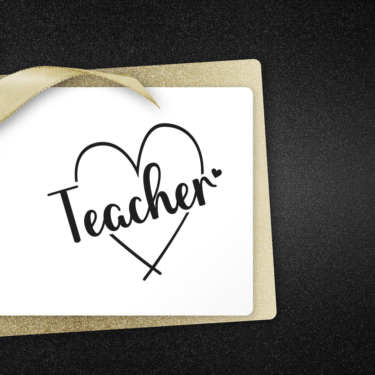Teacher heart rubber stamp on white card with gold glitter ribbon, perfect for classroom crafts, teacher gifts, and handmade cards.