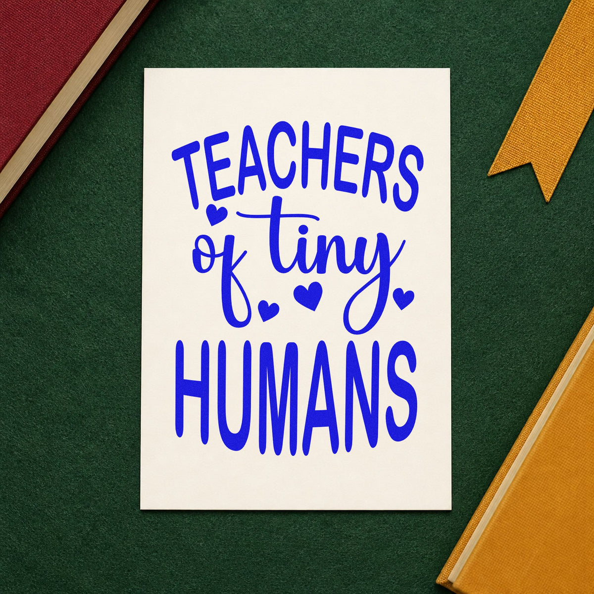 Teachers of Tiny Humans craft stamp imprinted in blue ink on paper, a design suited to sippy cup labels.