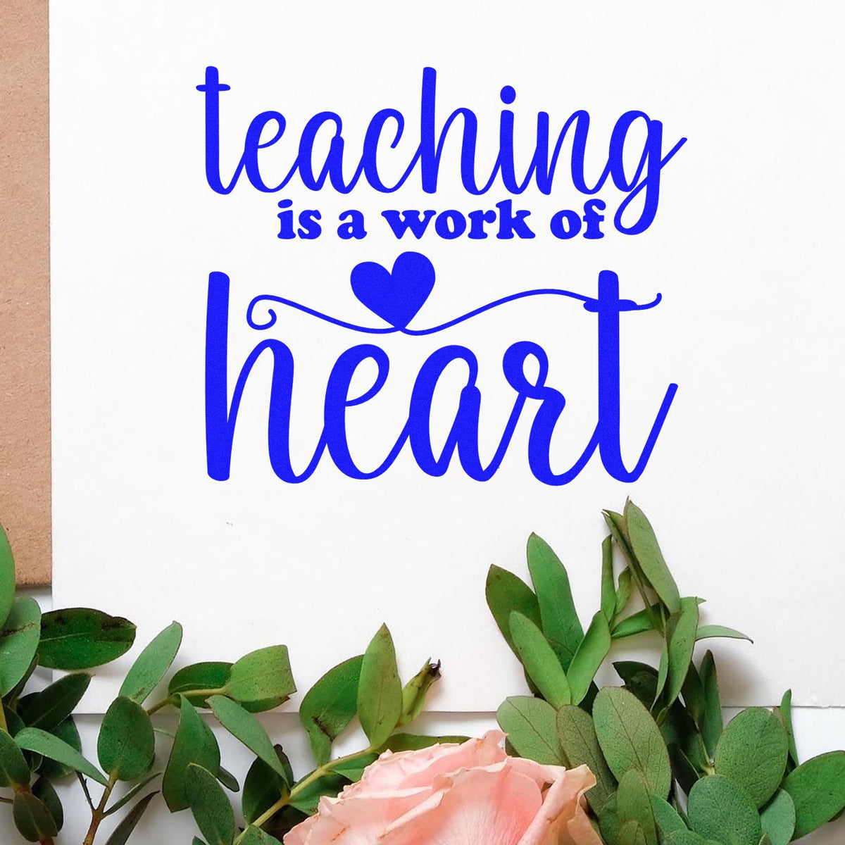 Teaching is a Work of Heart rubber stamp design in blue script with heart accent, perfect for teacher gifts and classroom crafts.