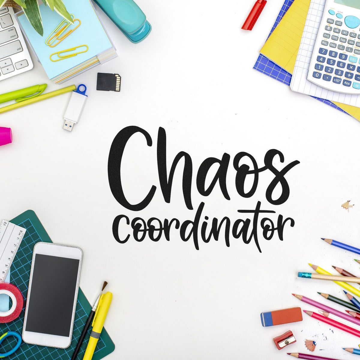 Chaos coordinator rubber stamp design surrounded by colorful office supplies for planners, teachers, and busy workspaces.