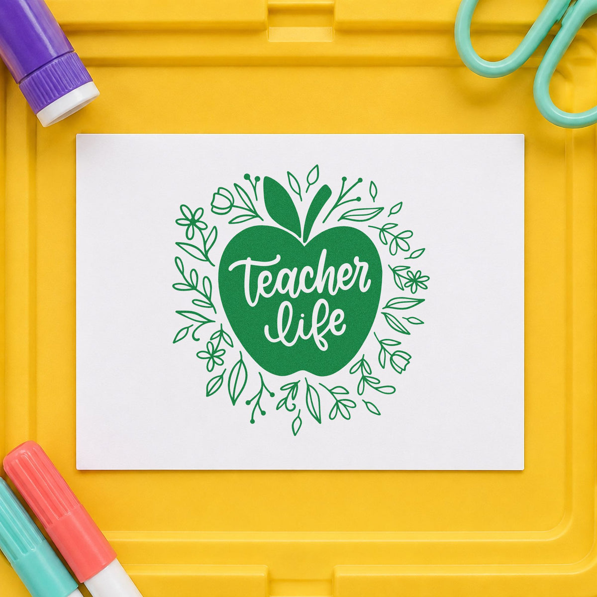 Teacher Life Floral Apple craft stamp imprint in green ink on a handmade project, one idea being framed door panel.