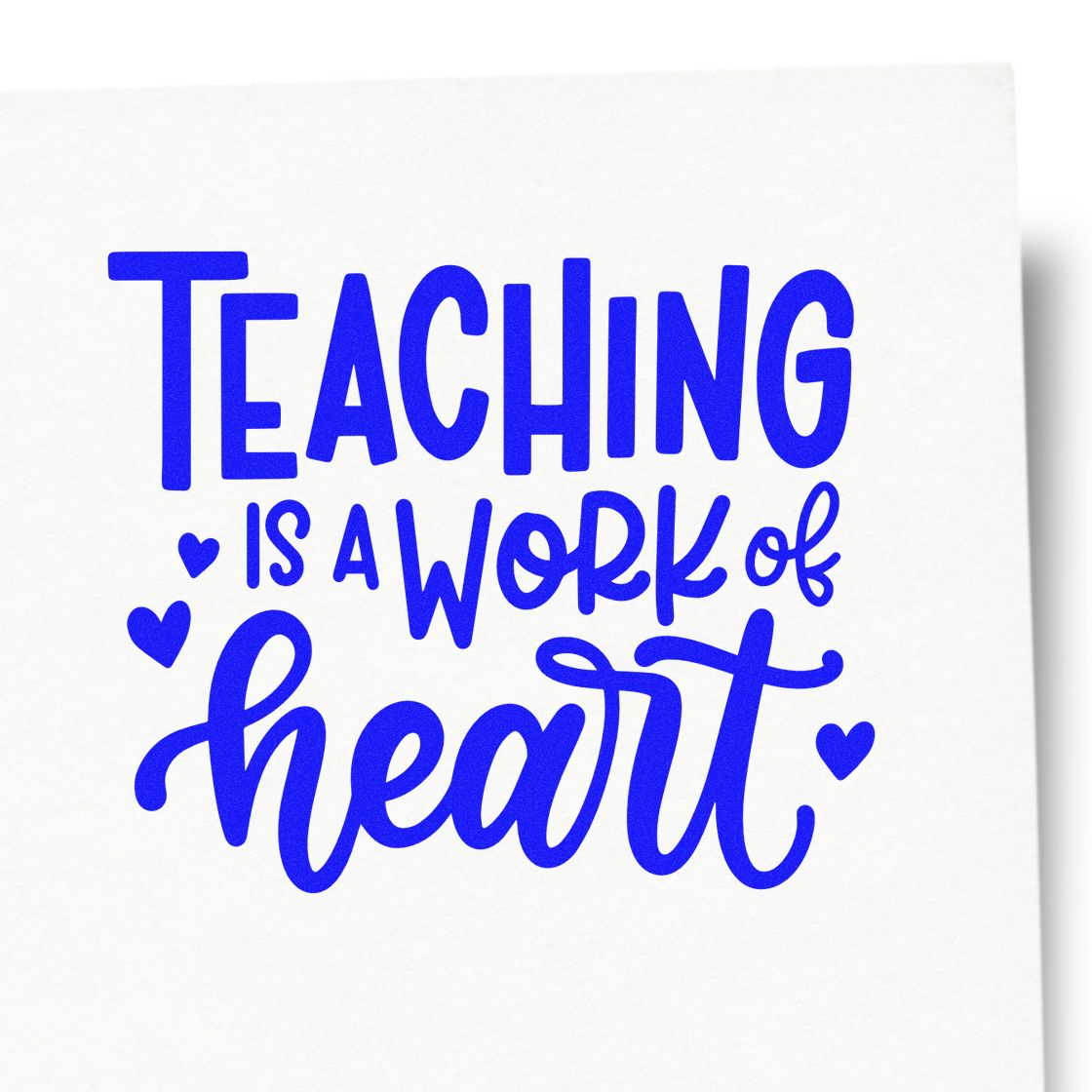 Blue teaching rubber stamp with Teaching is a work of heart quote and hearts for teacher appreciation gifts.