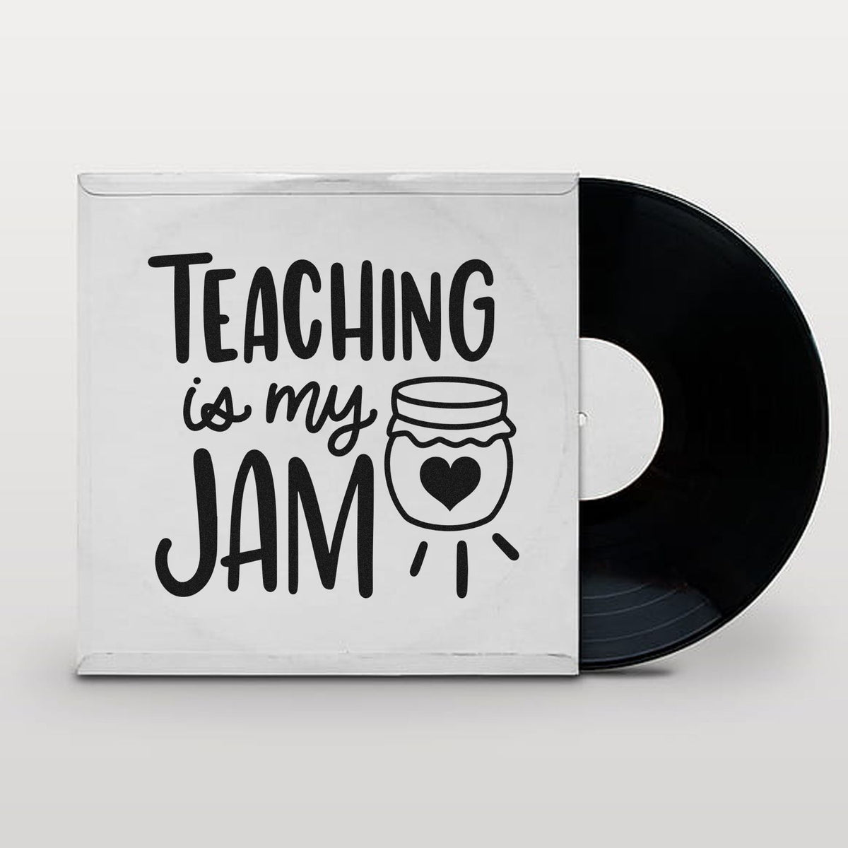 Teacher rubber stamp design reading Teaching is My Jam with jar heart icon and vinyl record for classroom crafts.
