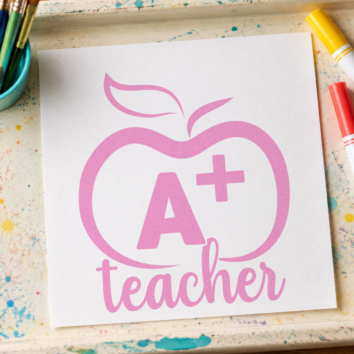 A Plus Teacher Outline Apple Wood Handle Stamp in use 10