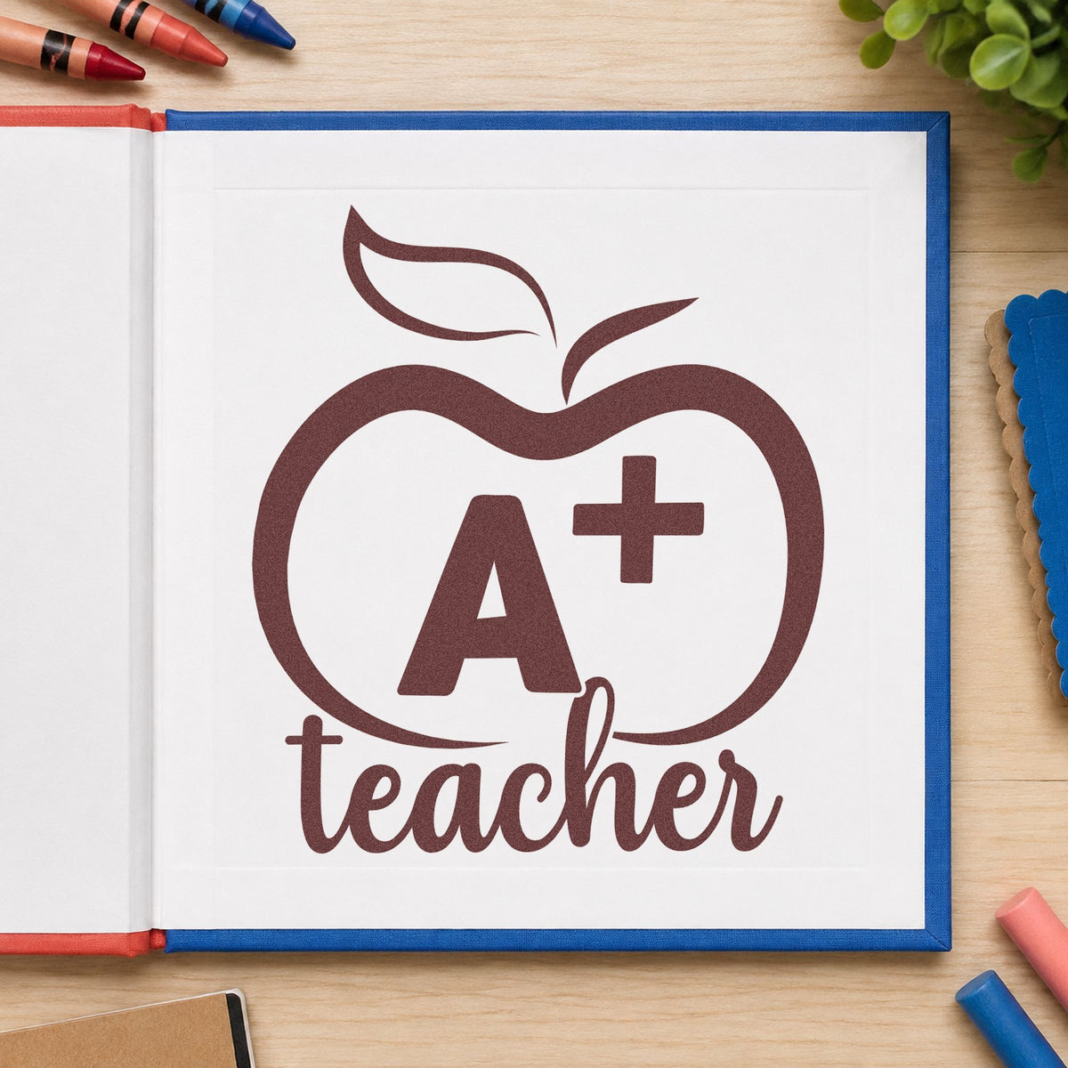 A Plus Teacher Outline Apple Wood Handle Stamp in use 4