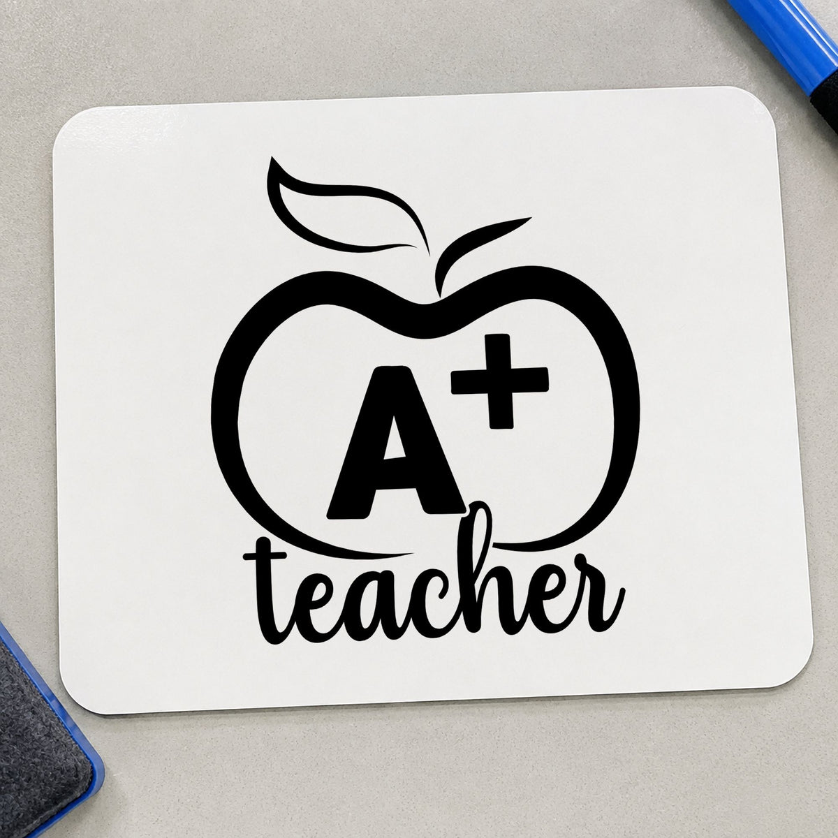 A Plus Teacher Outline Apple Wood Handle Stamp in use 9