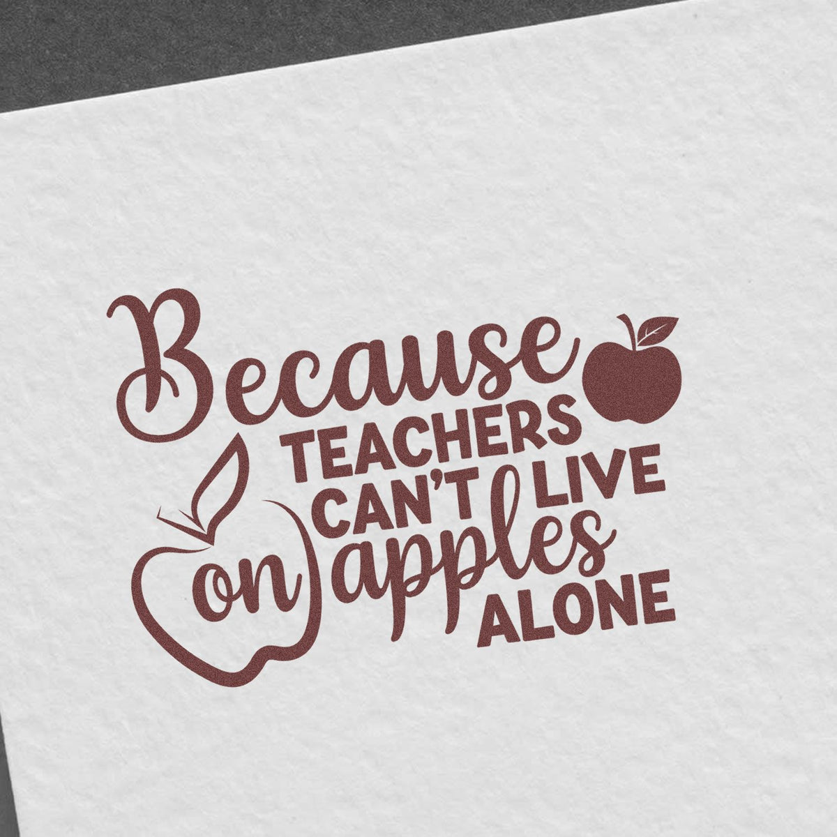 Teacher rubber stamp design with apple icon and quote, Because teachers cant live on apples alone.