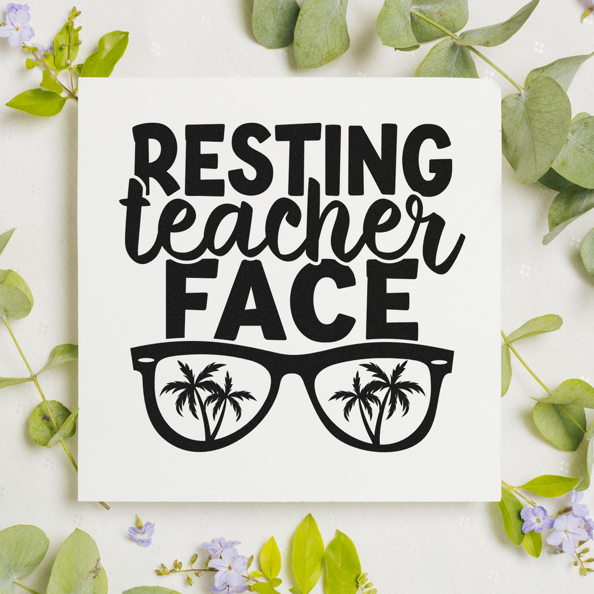 Resting teacher face rubber stamp design with glasses and palm trees, funny teacher gift for classroom crafting.