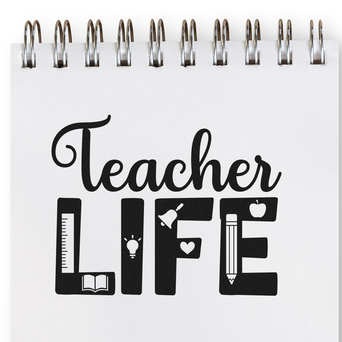 Teacher Life rubber stamp design with school icons on a spiral notebook page, ideal for educators and classroom crafts.