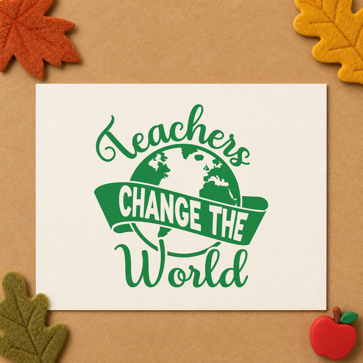 Teachers Change the World Banner craft stamp imprint in green ink on a handmade project, one idea being culture unit pages.
