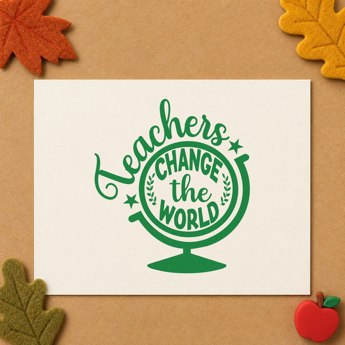 Teachers Change the World Stand craft stamp imprint in green ink on a handmade project, one idea being framed honors alcove.