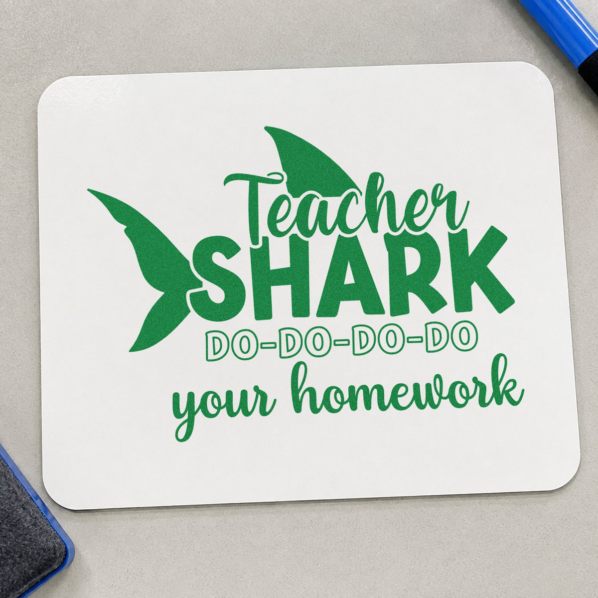 Teacher Shark Homework craft stamp imprint in green ink on a handmade project, one idea being homework chart pages.