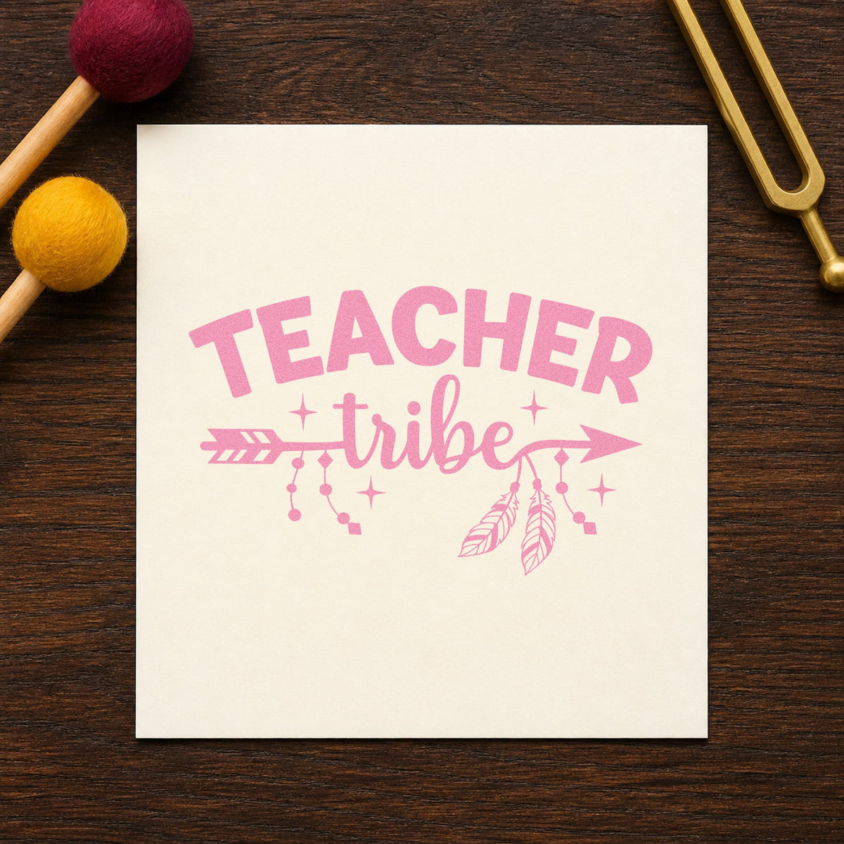 Teacher Tribe Arrow craft stamp in purple ink on cardstock, an easy option for team retreat tags.