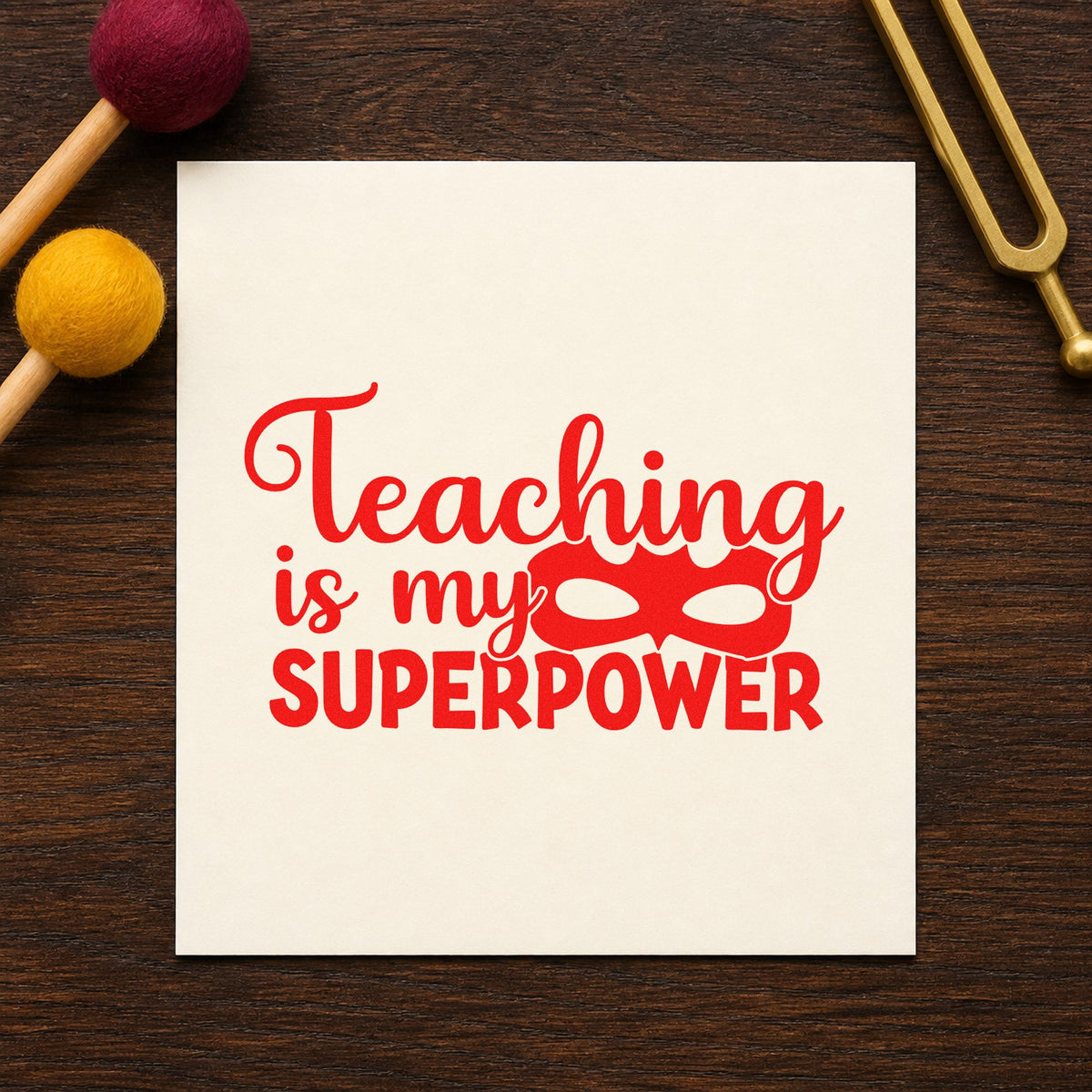 Teaching Is My Superpower Mask rubber stamp shown in red ink, stamped for projects such as world book notes.