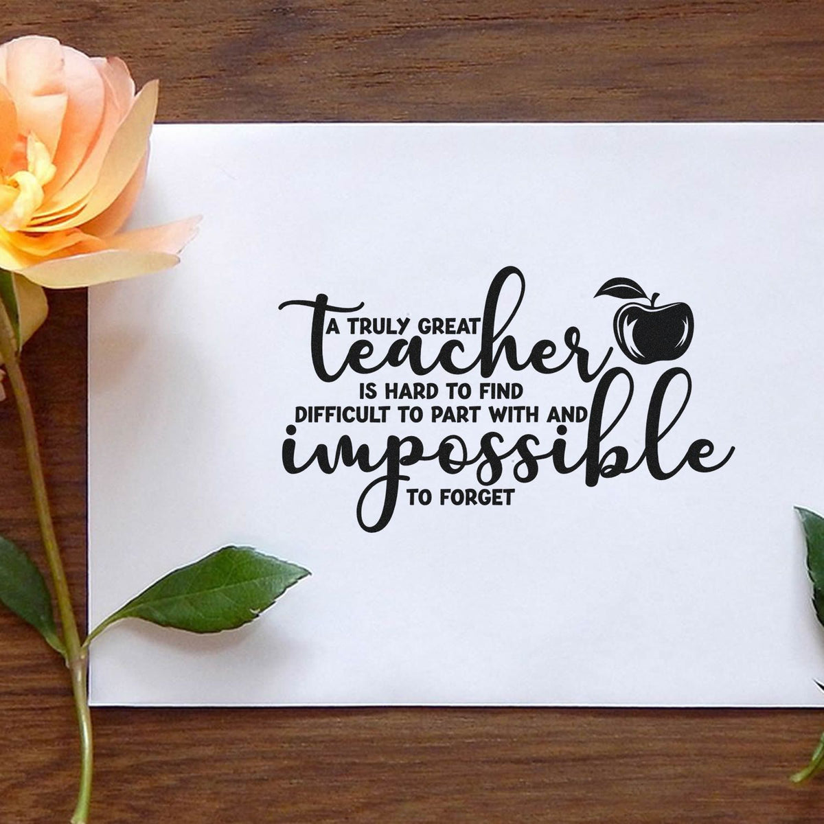 Teacher appreciation rubber stamp with quote A truly great teacher and apple icon for handmade cards.