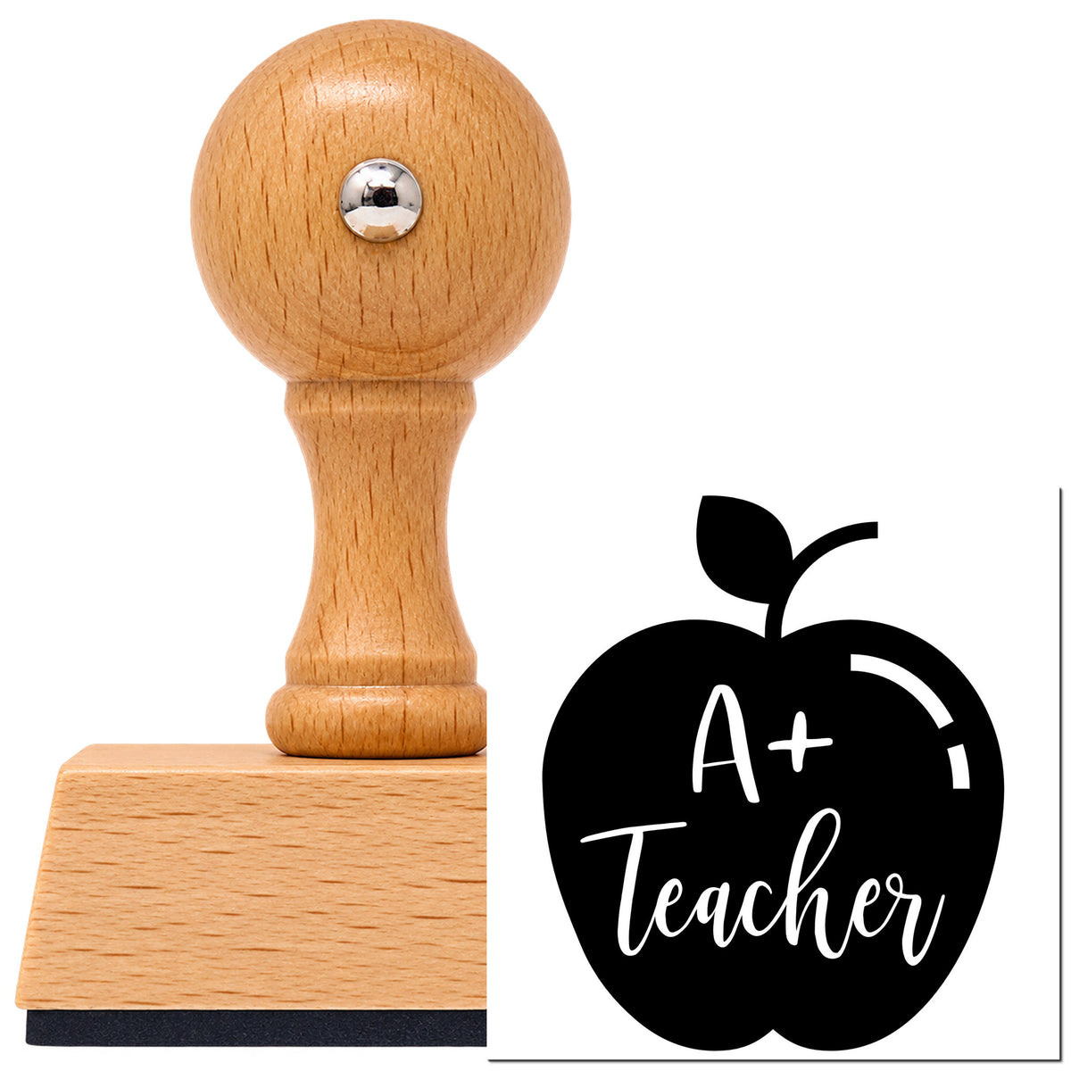A Plus Teacher Solid Apple Script Lettering Vintage Pro rubber stamp in European beech wood with a round knob handle, shown beside its black imprint.