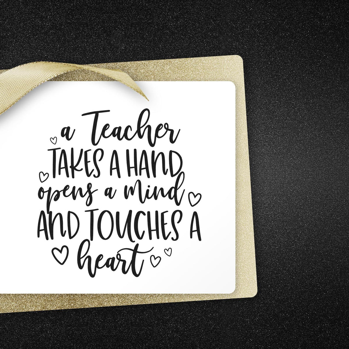 Teacher appreciation rubber stamp design with hand-lettered quote: A teacher takes a hand, opens a mind and touches a heart.