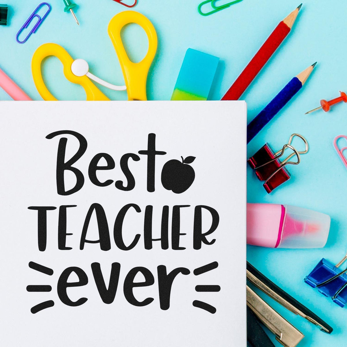 Best Teacher Ever rubber stamp design with school supplies and stationery on a blue background