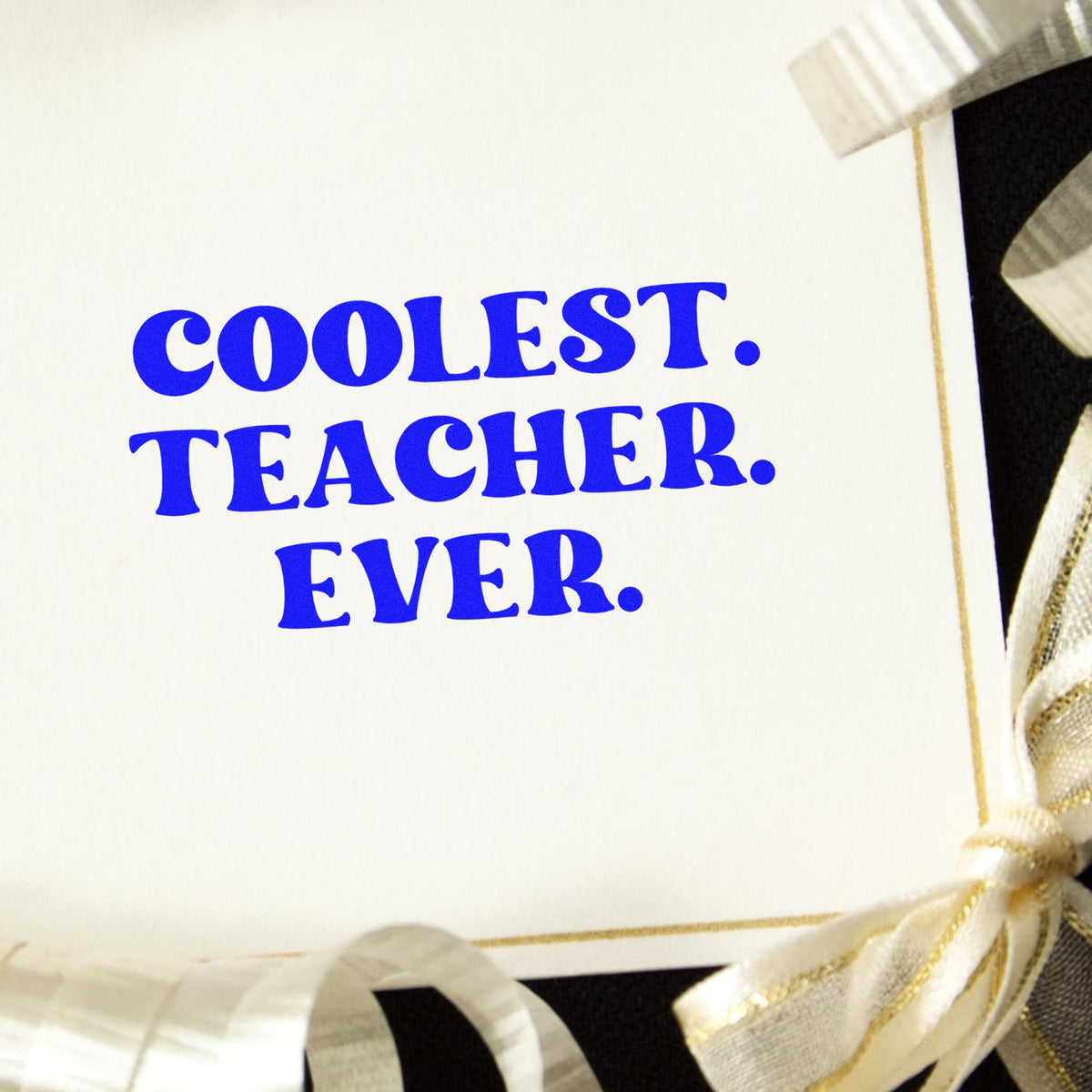 Blue rubber stamp with Coolest Teacher Ever text for teacher appreciation cards and gifts.