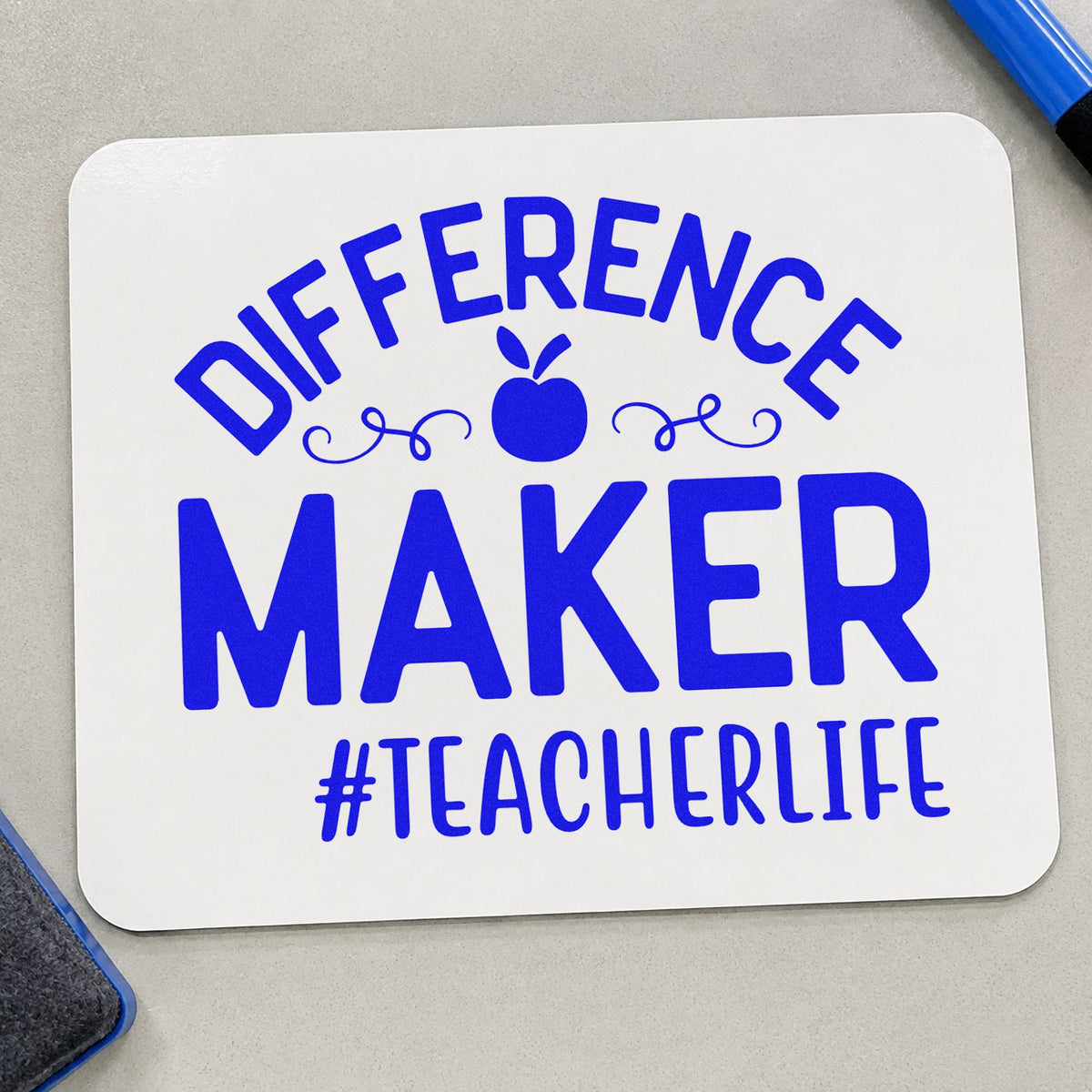 Difference Maker Teacher Life craft stamp in blue ink on cardstock, an easy option for fleece sleeve panels.