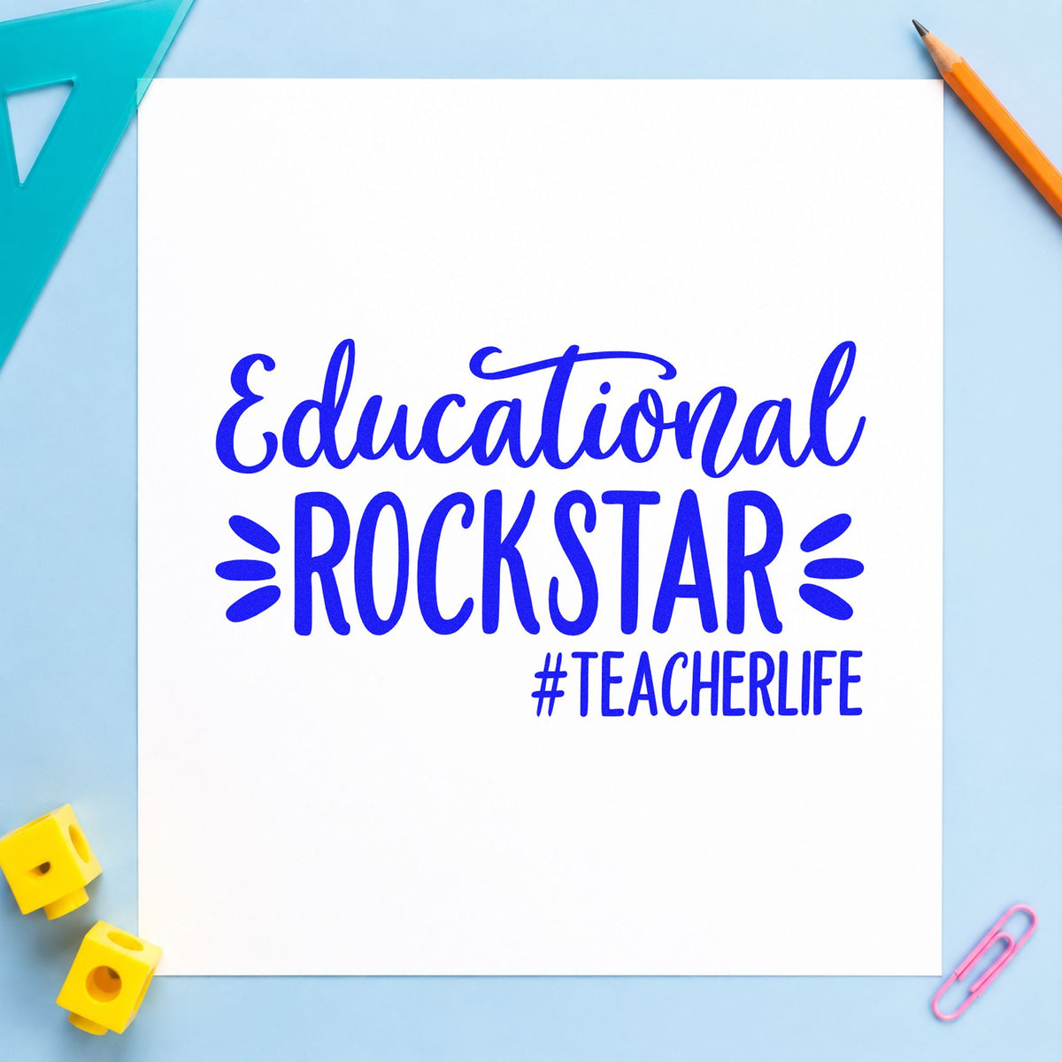 Educational Rockstar Teacher Life craft stamp imprinted in blue ink on paper, a design suited to ticket roll seals.