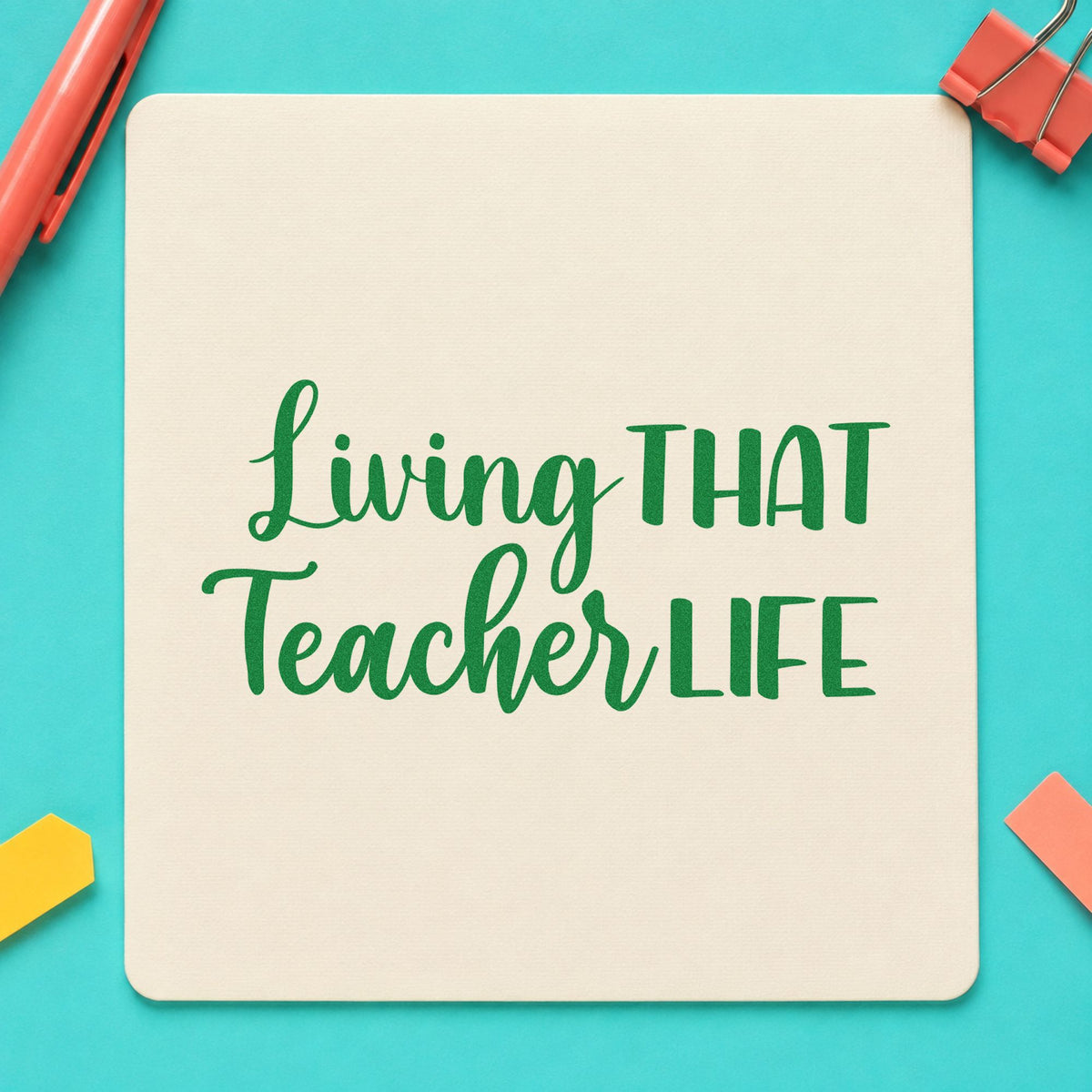 Living That Teacher Life craft stamp imprint in green ink on a handmade project, one idea being planner cover pages.