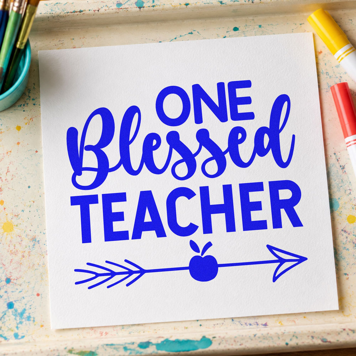 One Blessed Teacher Apple craft stamp imprinted in blue ink on paper, a design suited to offering bag seals.