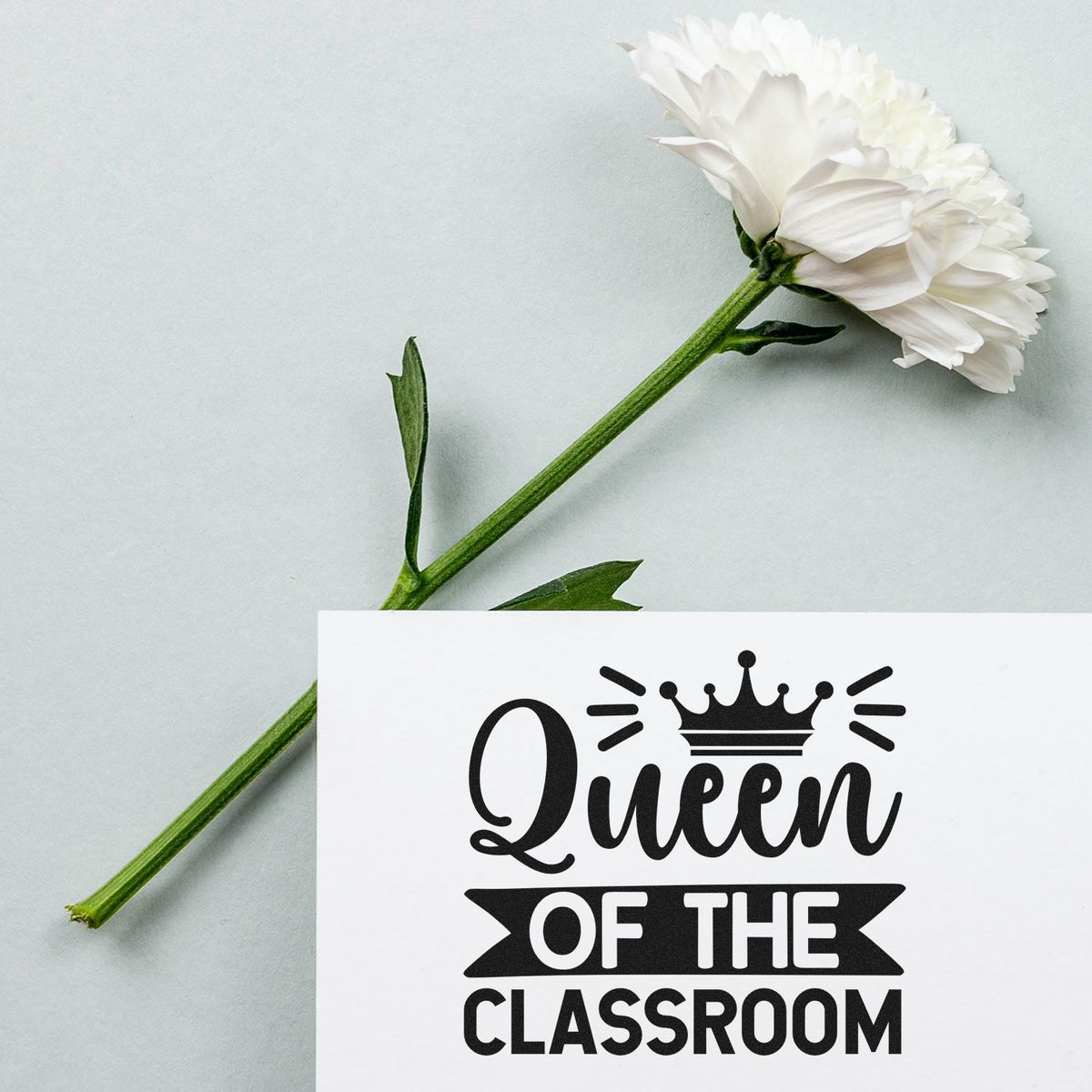 Queen of the Classroom rubber stamp mockup with crown design, perfect for teacher gifts and classroom crafts.