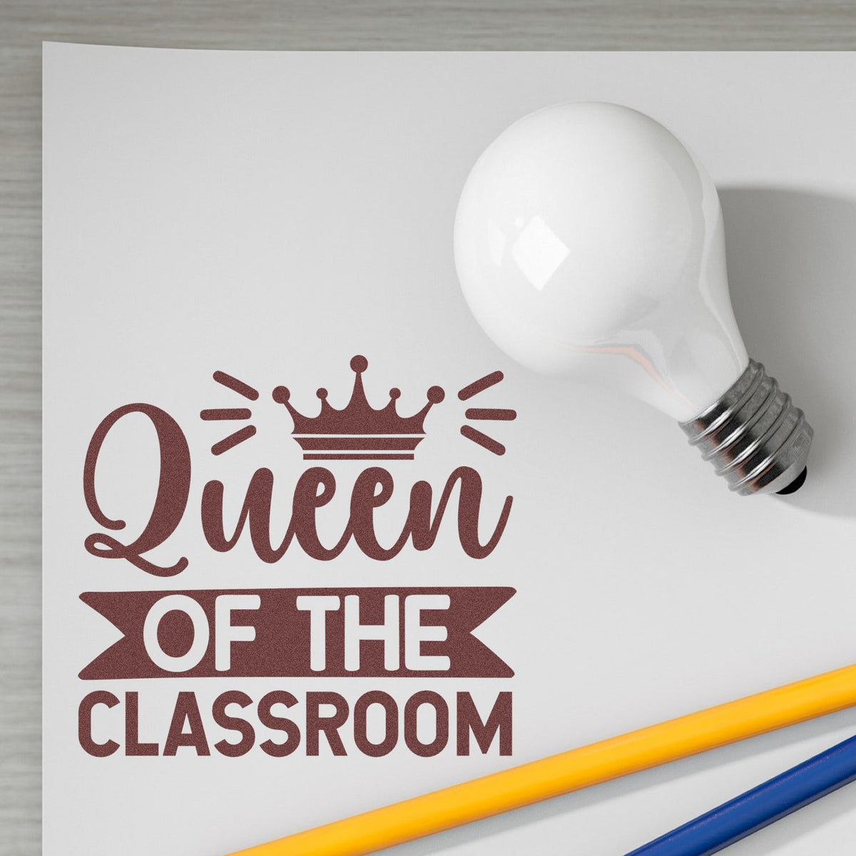 Queen of the Classroom teacher rubber stamp design with crown and bold classroom lettering for school crafts and gifts
