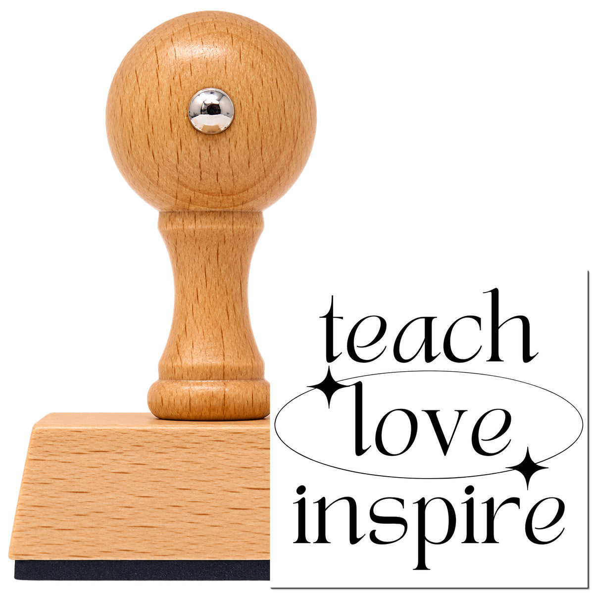 Teach Love Inspire Orbit With Sparkles Vintage Pro rubber stamp in European beech wood with a round knob handle, shown beside its black imprint.