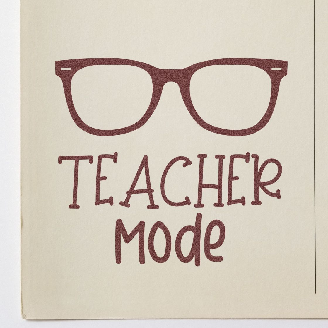 Teacher mode rubber stamp with glasses icon, ideal for classroom supplies, teacher gifts, and educator stationery.