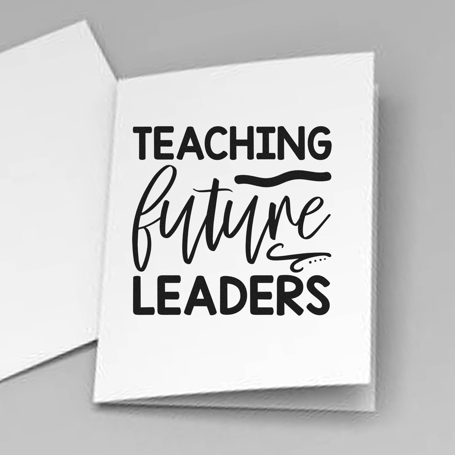 Teaching future leaders rubber stamp for teachers, featuring bold modern typography on a clean white background.