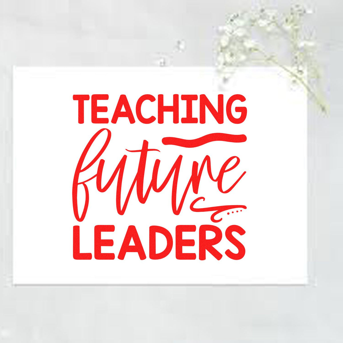Teaching Future Leaders Script rubber stamp shown in red ink, stamped for projects such as prefect badge tags.
