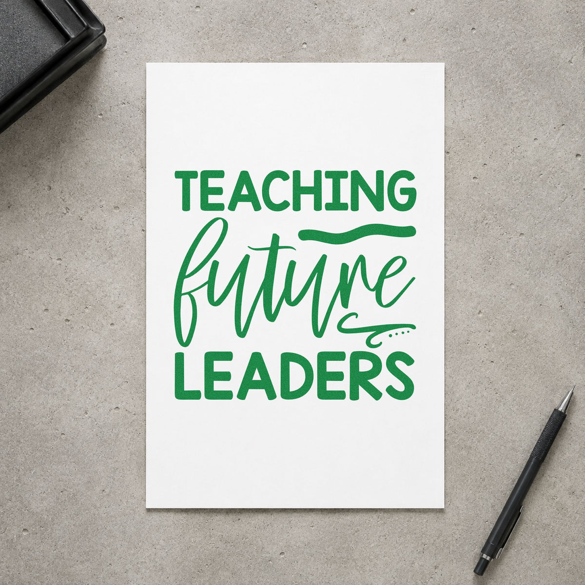 Teaching Future Leaders Script craft stamp imprint in green ink on a handmade project, one idea being election ballot pages.