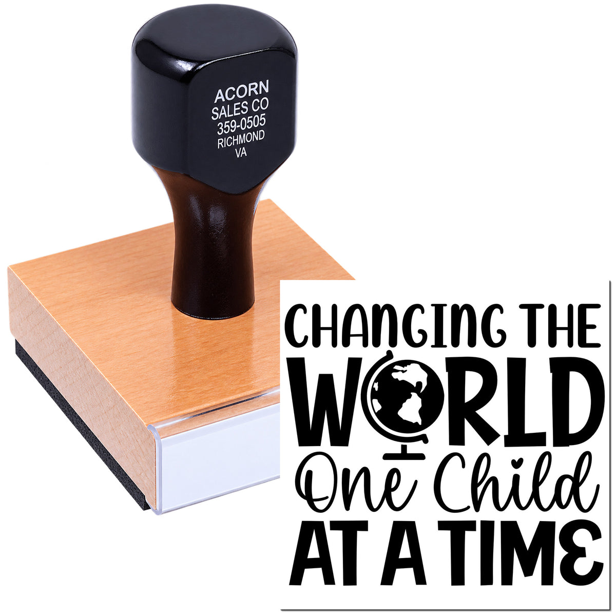 Self-inking custom rubber stamp with Changing the World One Child at a Time slogan for child advocacy branding.