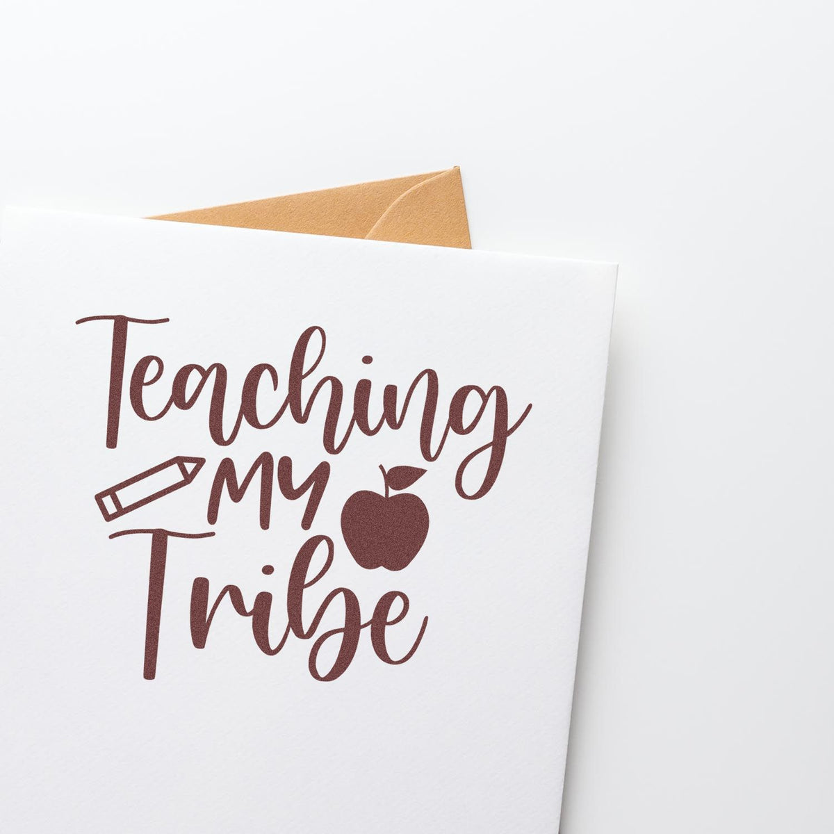Teaching My Tribe rubber stamp design for teacher appreciation cards, featuring a pencil and apple icon.