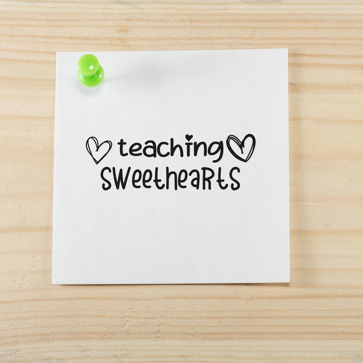 Teaching Sweethearts rubber stamp design on pinned paper with hearts, perfect for teacher appreciation crafts and gifts.