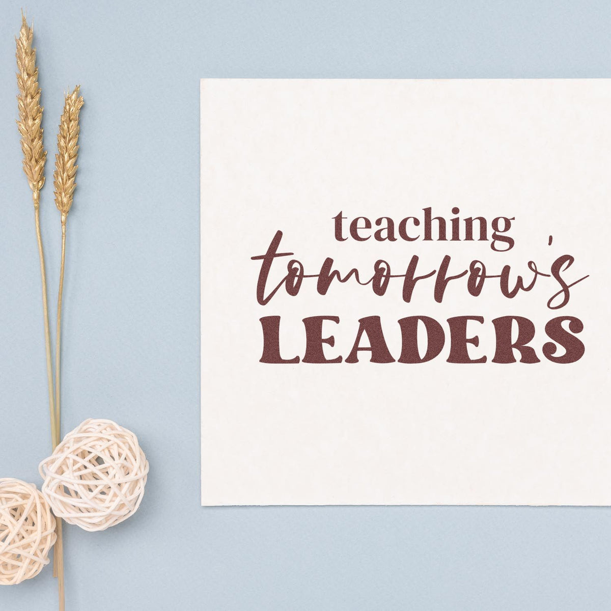 Teacher rubber stamp with teaching tomorrows leaders quote for classroom branding, gifts, and educator stationery.