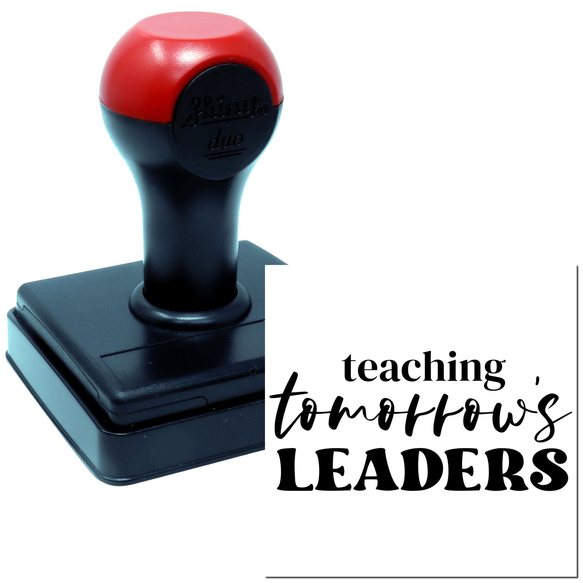 Self-inking rubber stamp with teaching tomorrows leaders imprint for teachers and education recognition.