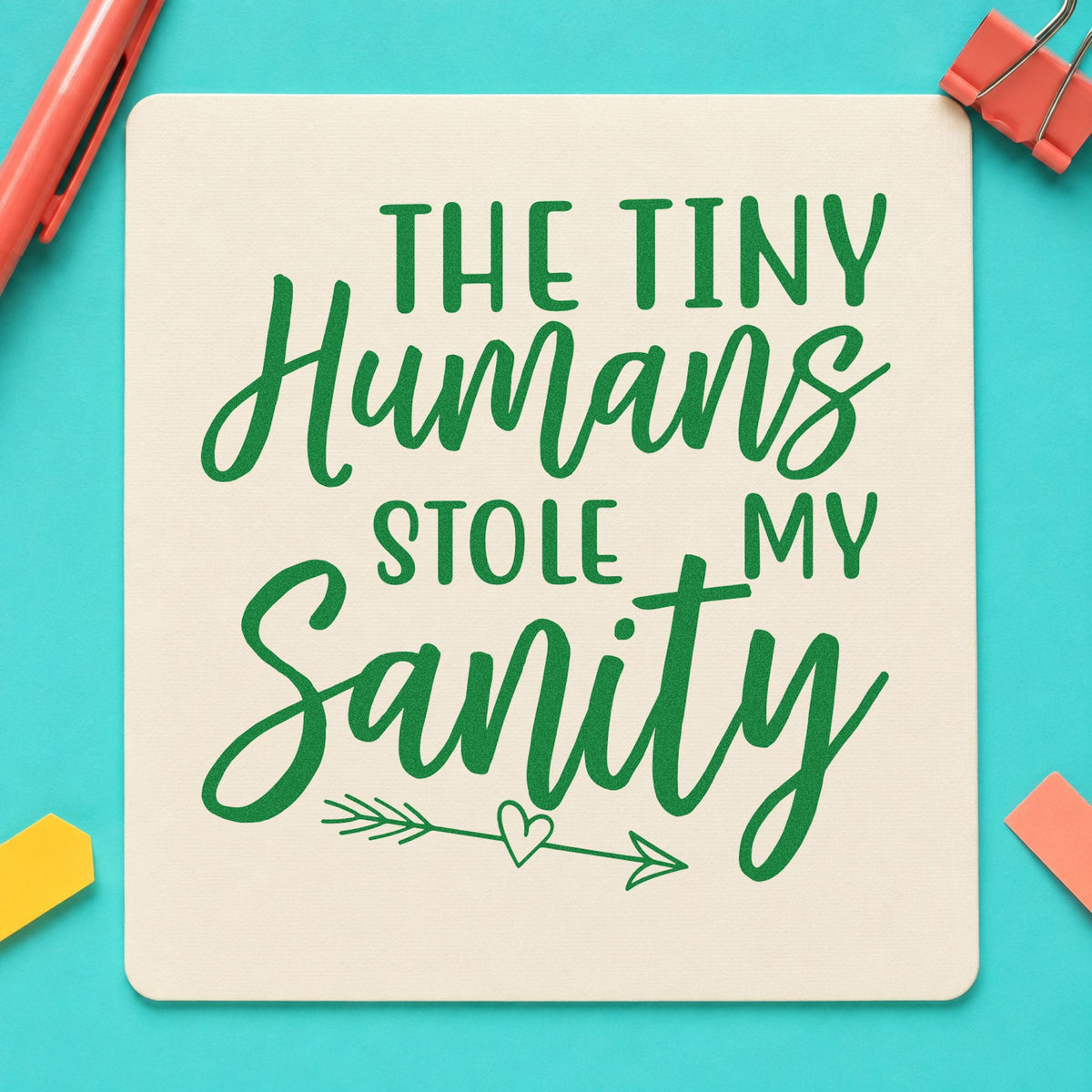 Tiny Humans Stole Sanity craft stamp imprint in green ink on a handmade project, one idea being framed staff sofa.