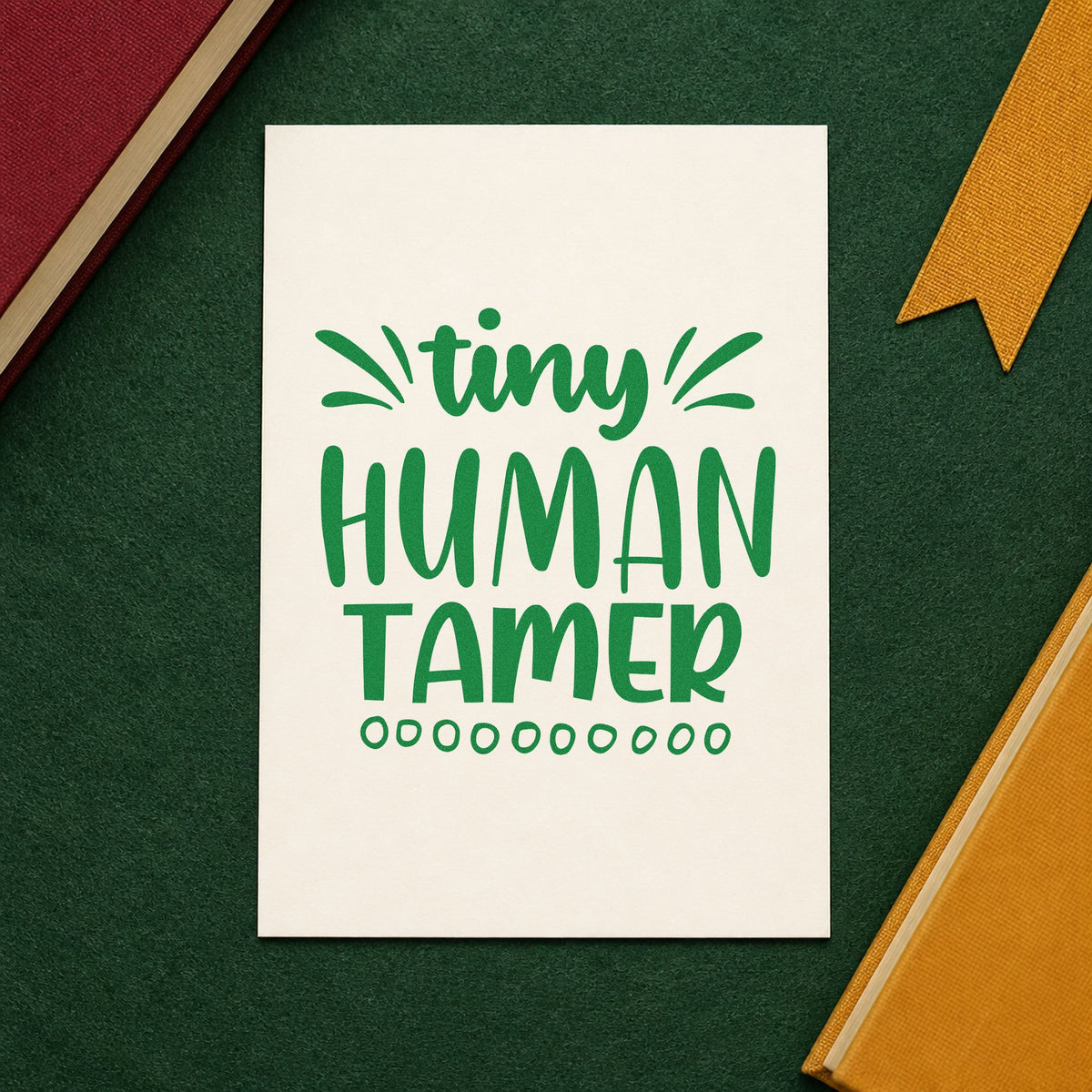 Tiny Human Tamer Lettering craft stamp imprint in green ink on a handmade project, one idea being attendance pages.