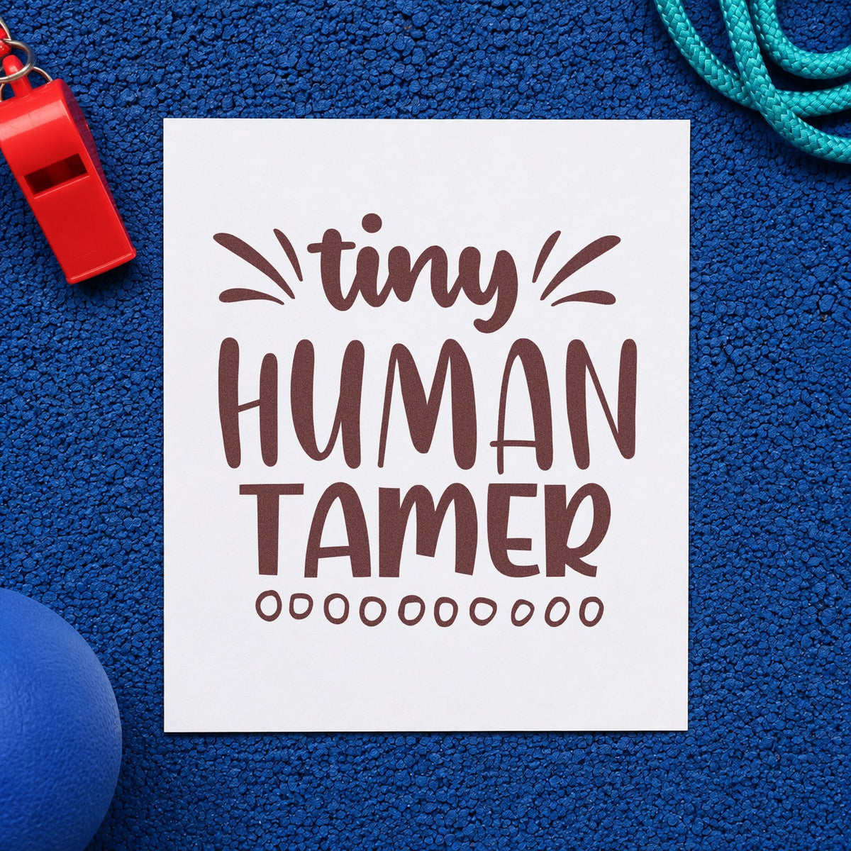 Tiny Human Tamer Lettering rubber stamp printed in brown ink, ready for toy crate labels and similar paper crafts.