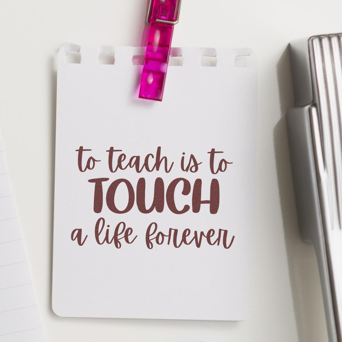 Teacher rubber stamp design with quote, To teach is to touch a life forever, for classroom gifts and stationery.