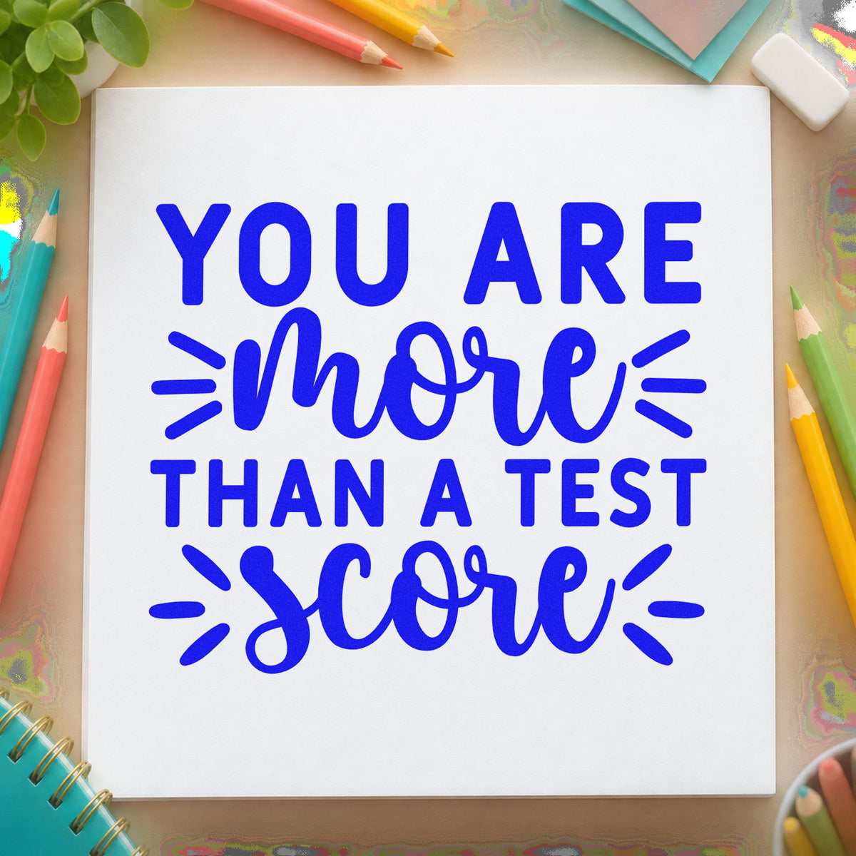 More Than Test Score craft stamp in blue ink on cardstock, an easy option for hoodie pocket panels.