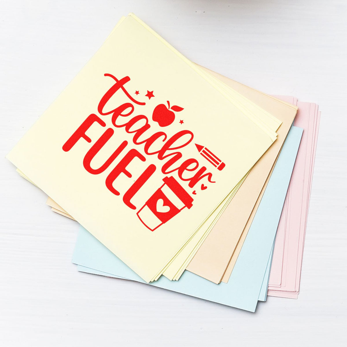 Teacher Fuel rubber stamp design on pastel stationery cards, ideal for classroom gifts, teacher appreciation, and custom crafts.