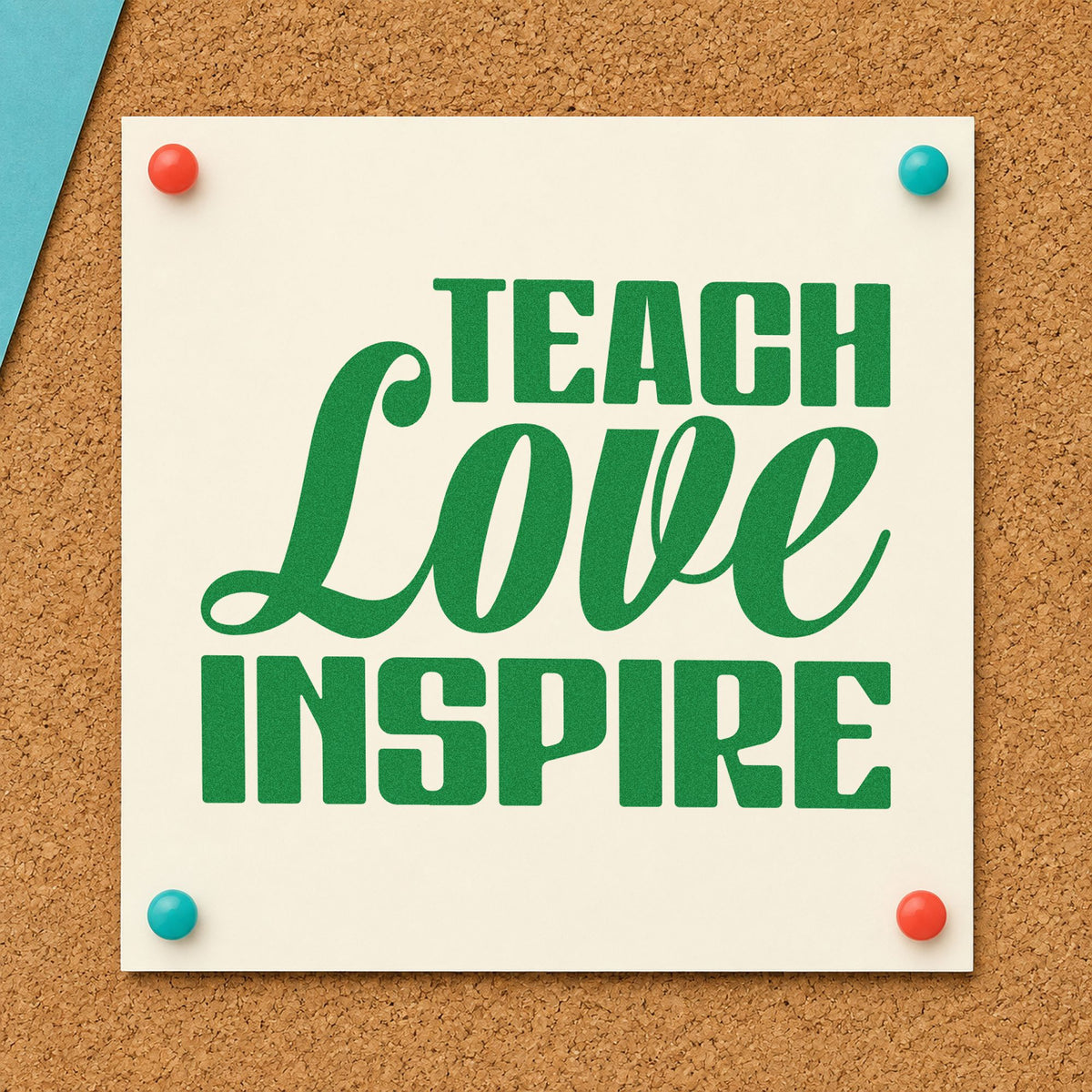 Teach Love Inspire Bold Script craft stamp imprint in green ink on a handmade project, one idea being vow renewal pages.