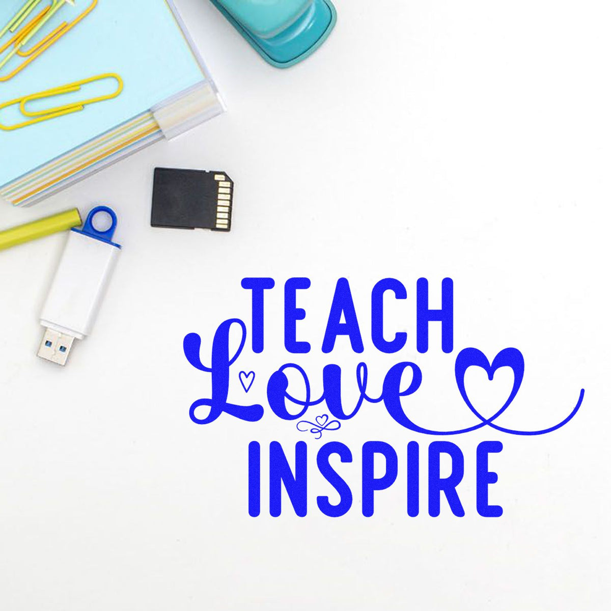Teach Love Inspire rubber stamp design in blue, ideal for teachers, classroom crafts, and back-to-school stationery.