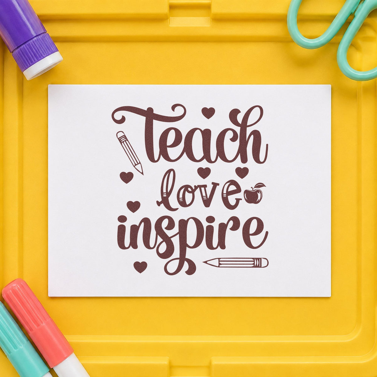 Teach Love Inspire Hearts Wood Handle Stamp in use 4