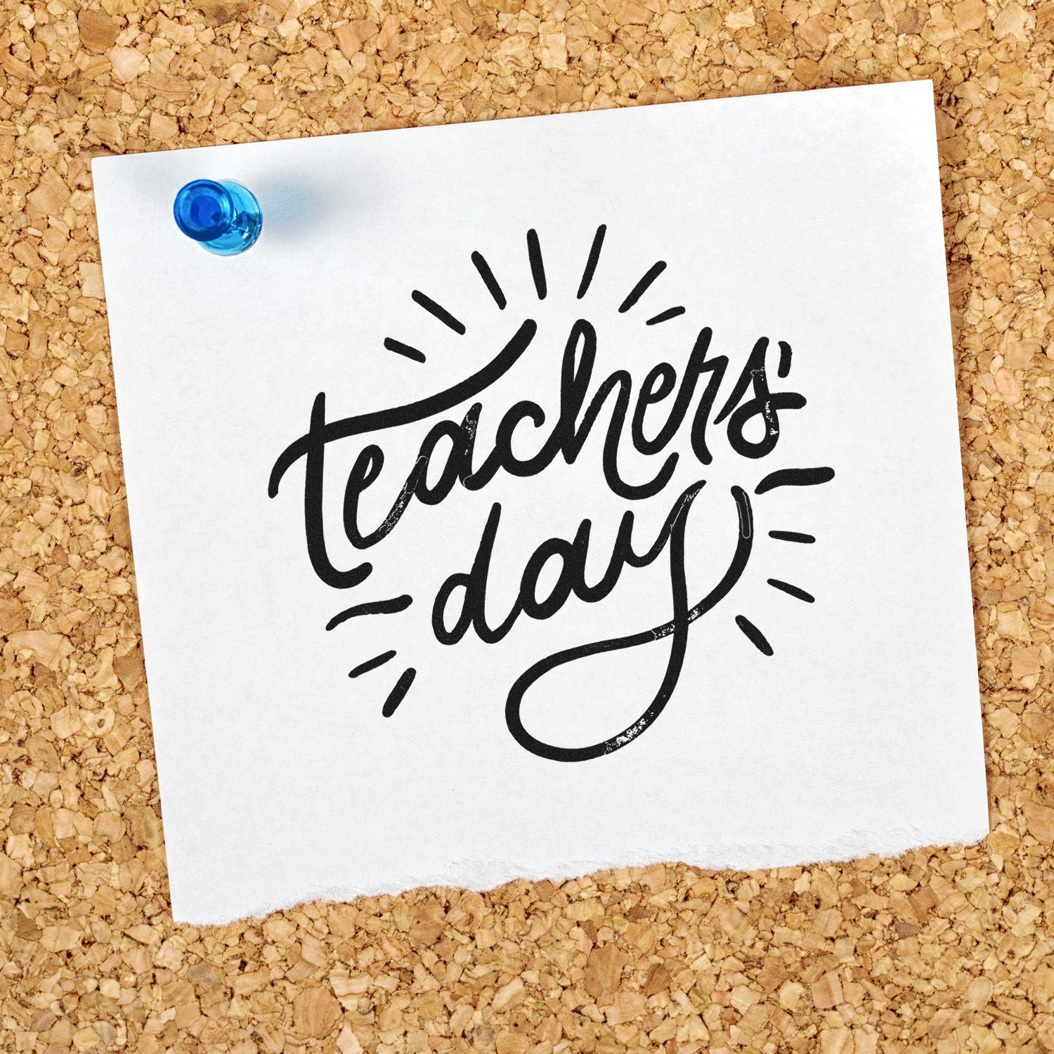 Teachers Day rubber stamp design on pinned paper, ideal for classroom crafts and teacher appreciation.